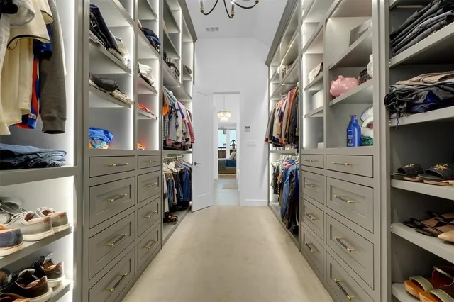 a view of a house with backyard porch and sitting area