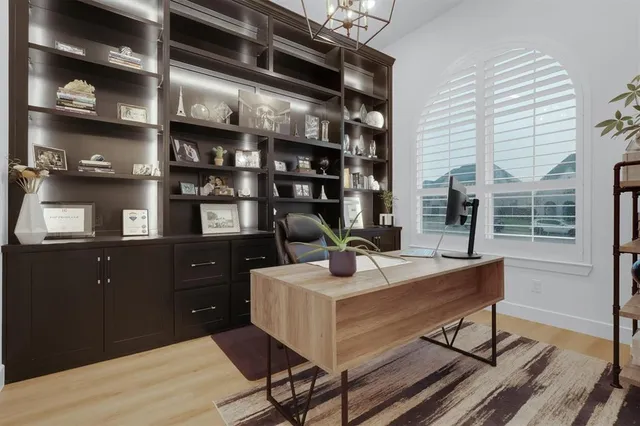 a view of a dining room with furniture