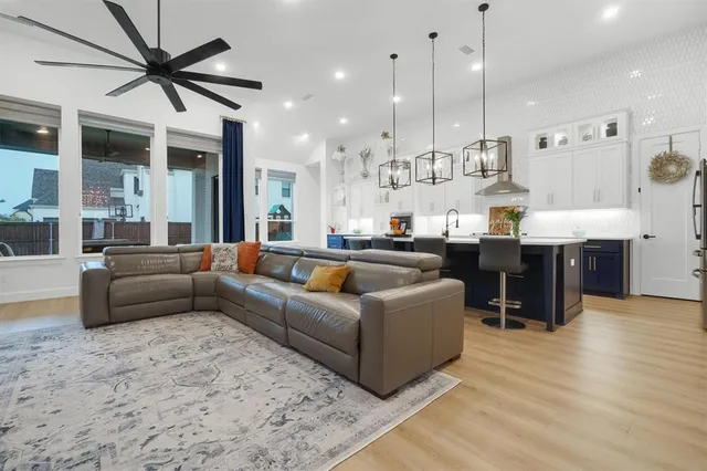 a kitchen with a table and chairs in it