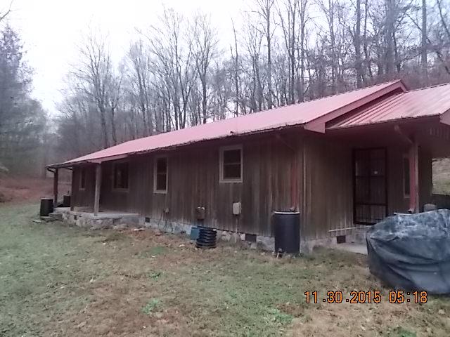 671 Tucker Road Lafayette, TN 37083 - Photo 2 of 20 a front view of a house