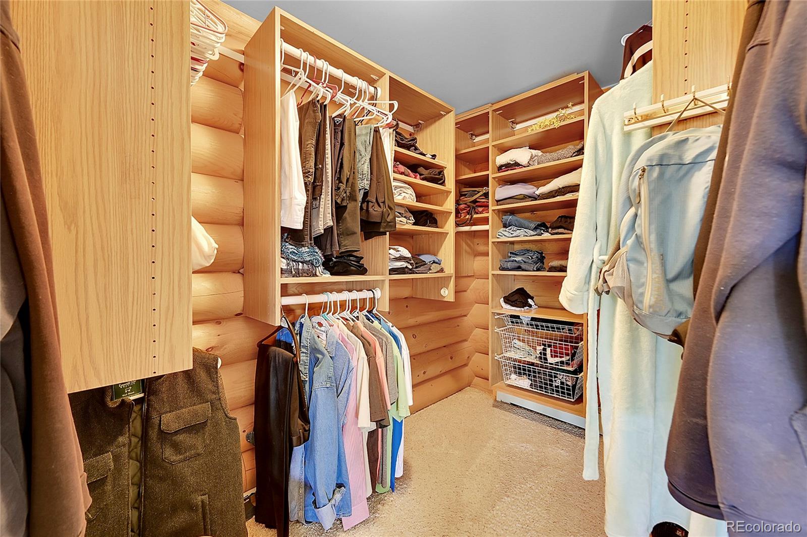 1392 Tapadero Road Bailey, CO 80421 - Photo 20 of 50 a view of walk in closet with clothes and shoes