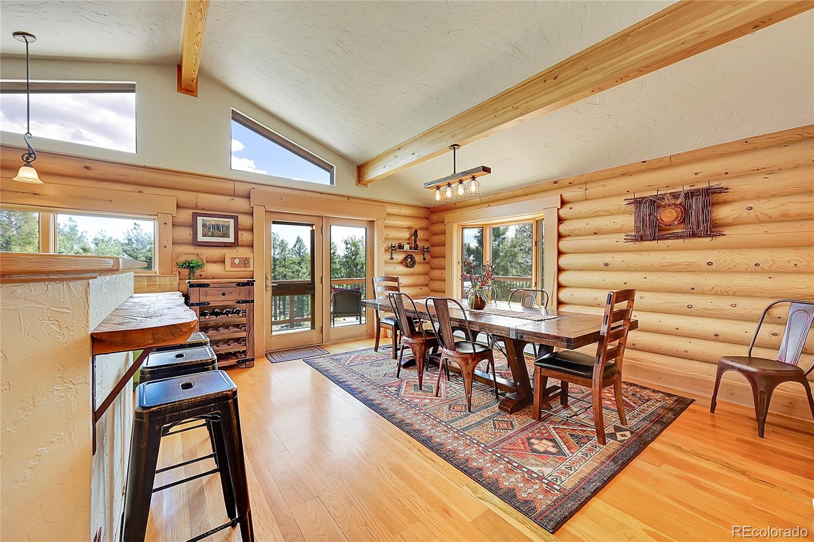 1392 Tapadero Road Bailey, CO 80421 - Photo 9 of 50 a view of a dining room with furniture window and outside view