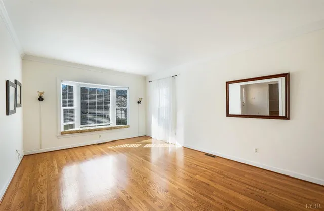 a kitchen with refrigerator and microwave