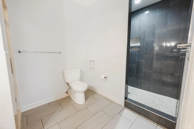 a view of deck with chairs and wooden fence