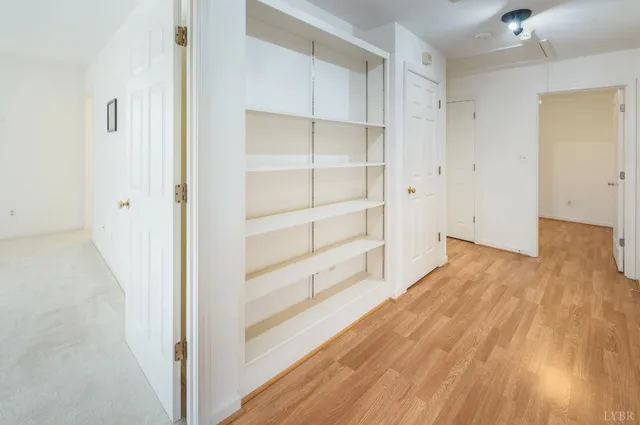 a balcony with wooden floor