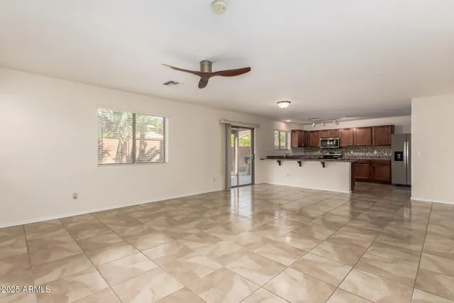 a view of a kitchen with a sink cabinets and window