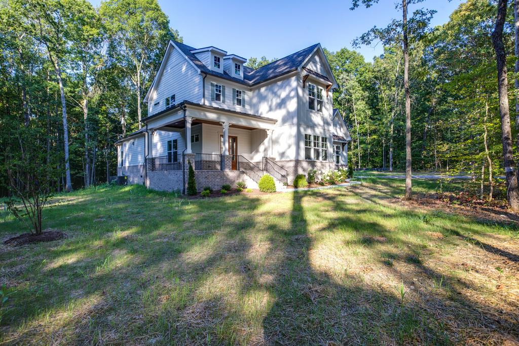 5908 Pinewood Road Franklin, TN 37064 - Photo 1 of 30 a view of a house with a yard