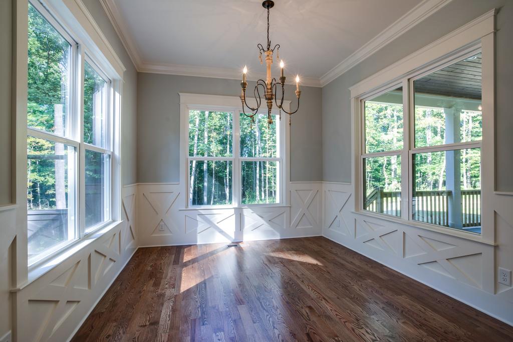 5908 Pinewood Road Franklin, TN 37064 - Photo 16 of 30 a view of empty room with wooden floor and fan