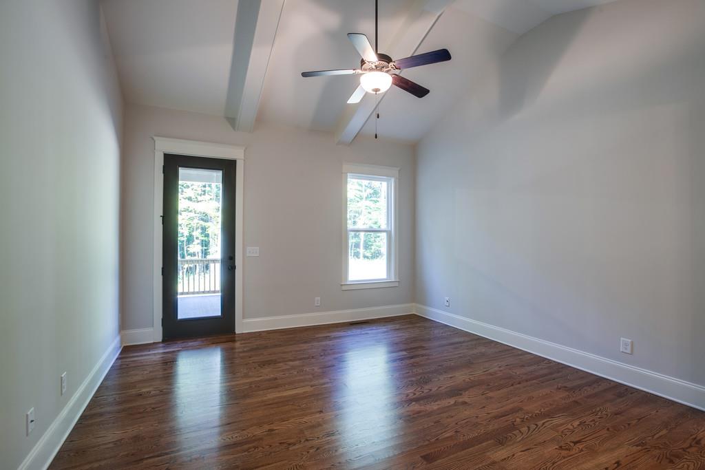 5908 Pinewood Road Franklin, TN 37064 - Photo 18 of 30 wooden floor in an empty room with a window