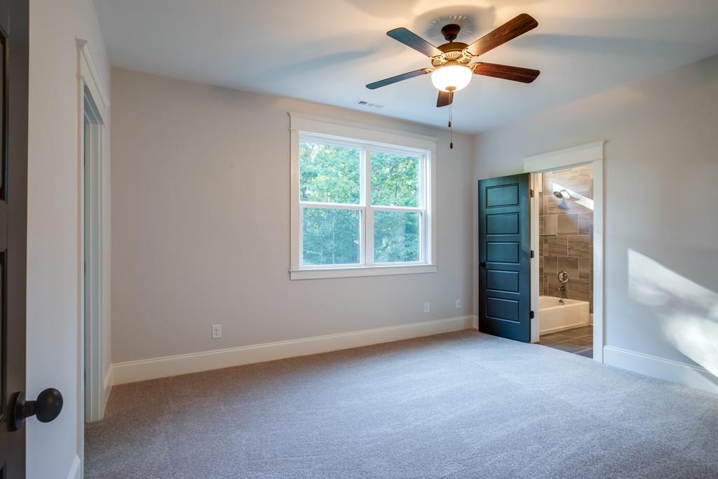 5908 Pinewood Road Franklin, TN 37064 - Photo 24 of 30 a view of an empty room with a window