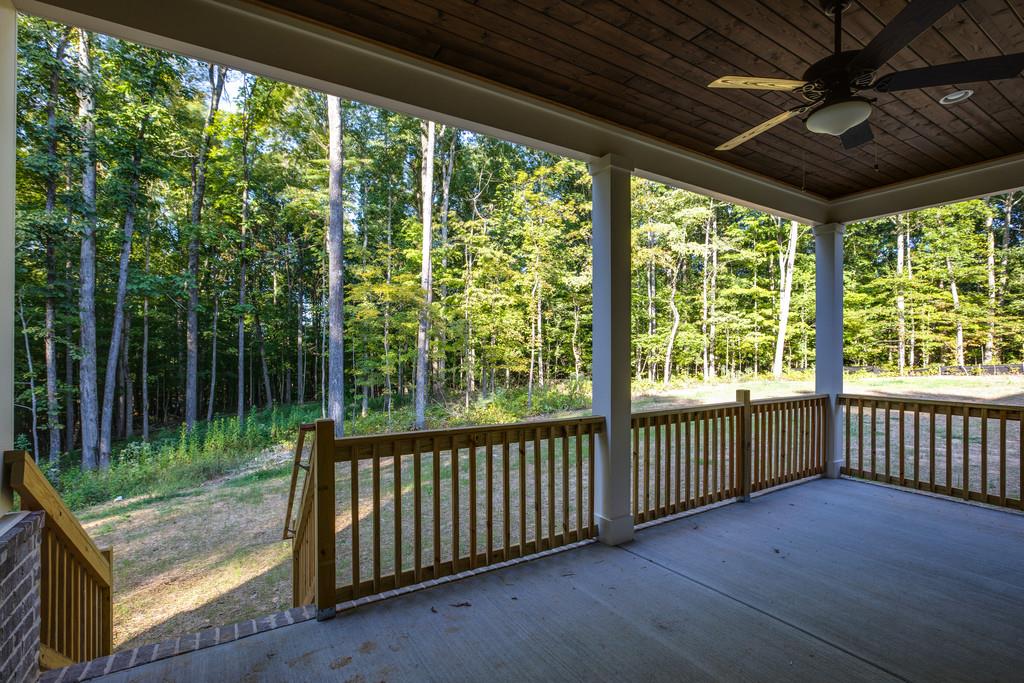 5908 Pinewood Road Franklin, TN 37064 - Photo 27 of 30 a view of a porch with wooden floor and outdoor space