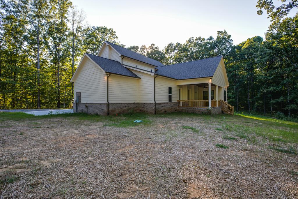 5908 Pinewood Road Franklin, TN 37064 - Photo 28 of 30 a view of a house with yard and a tree