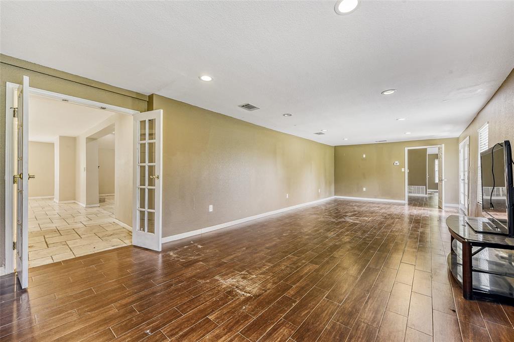 11350 County Road 377 Terrell, TX 75161 - Photo 12 of 24 a view of a big room with wooden floor and windows