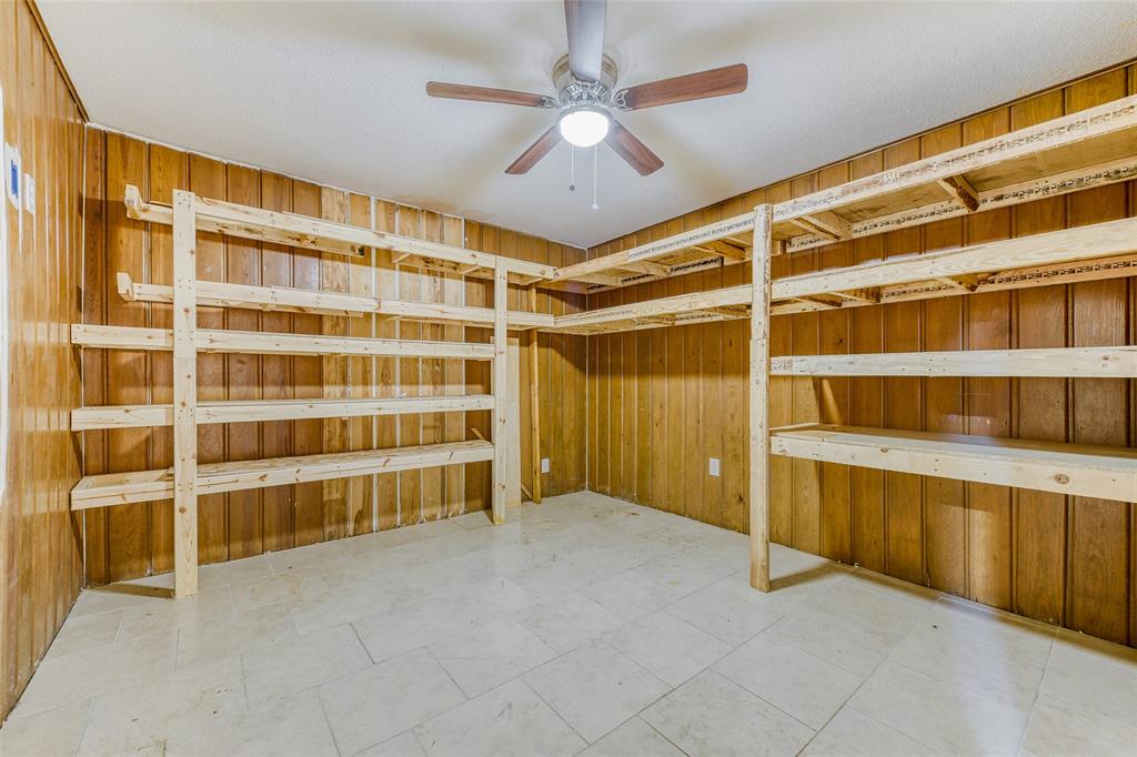 11350 County Road 377 Terrell, TX 75161 - Photo 20 of 24 a view of an empty room with a cabinet and a window