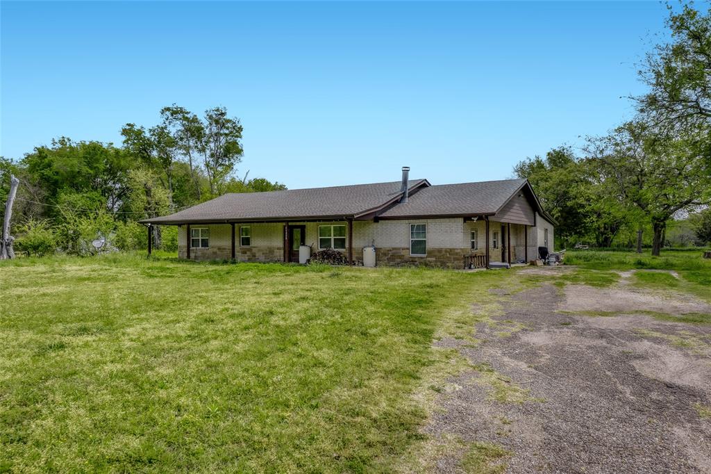 11350 County Road 377 Terrell, TX 75161 - Photo 2 of 24 a front view of a house with a yard