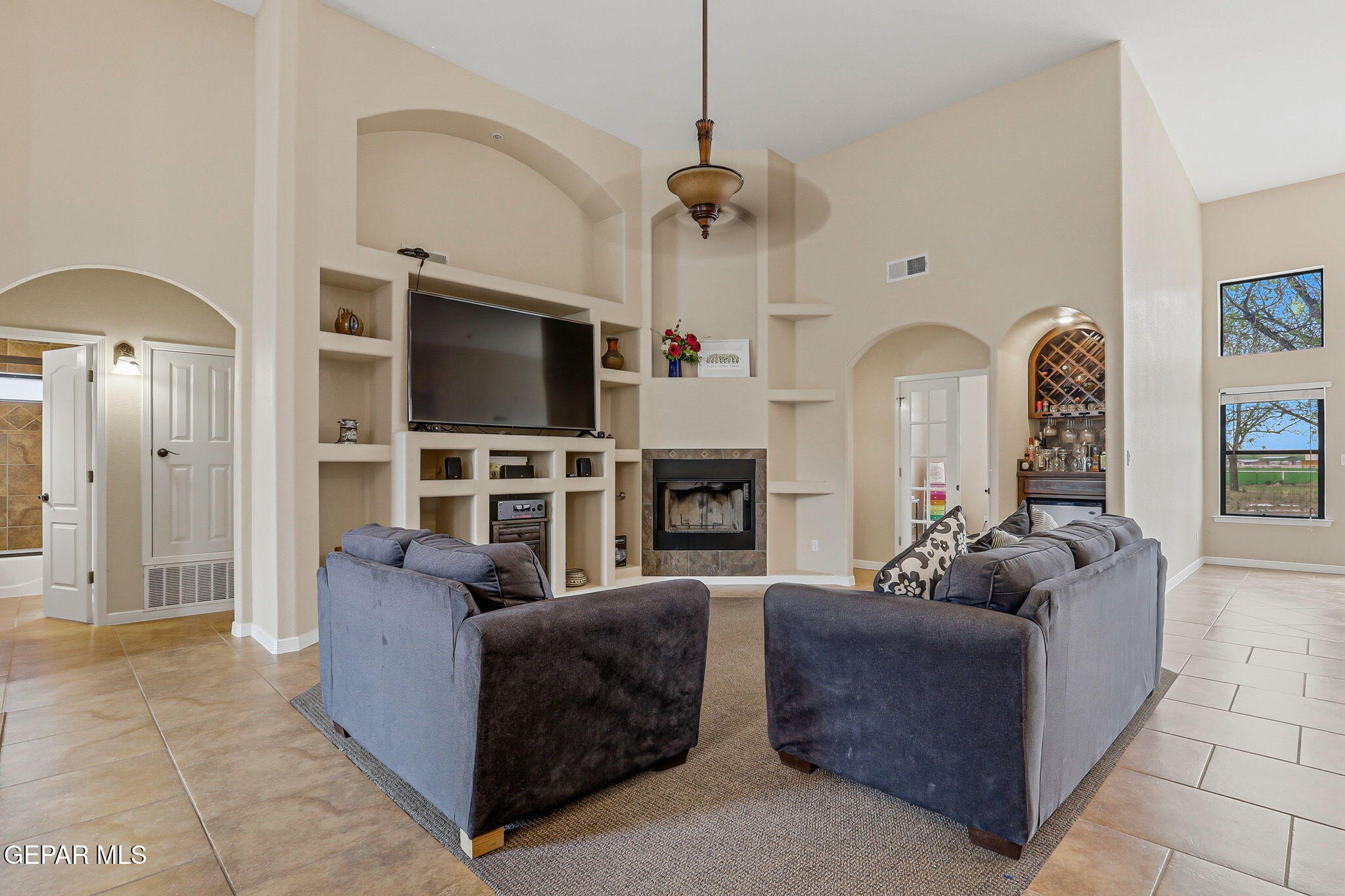 617 Wallace Road Anthony, NM 88021 - Photo 14 of 65 a living room with furniture and a flat screen tv