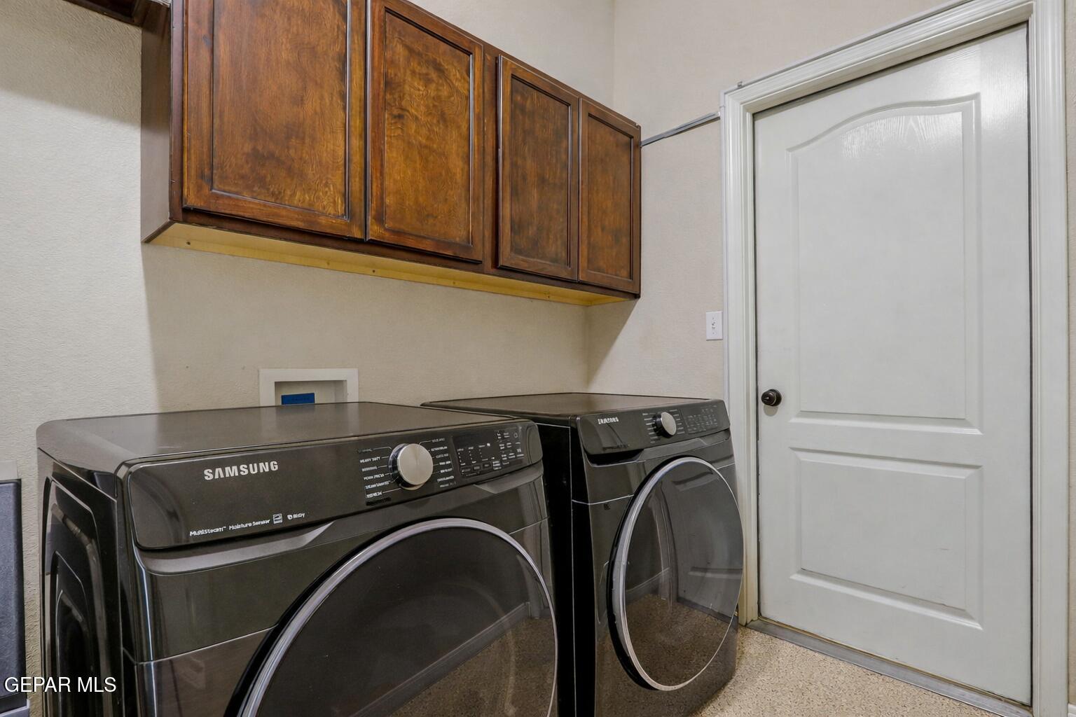 617 Wallace Road Anthony, NM 88021 - Photo 24 of 65 a utility room with dryer and washer