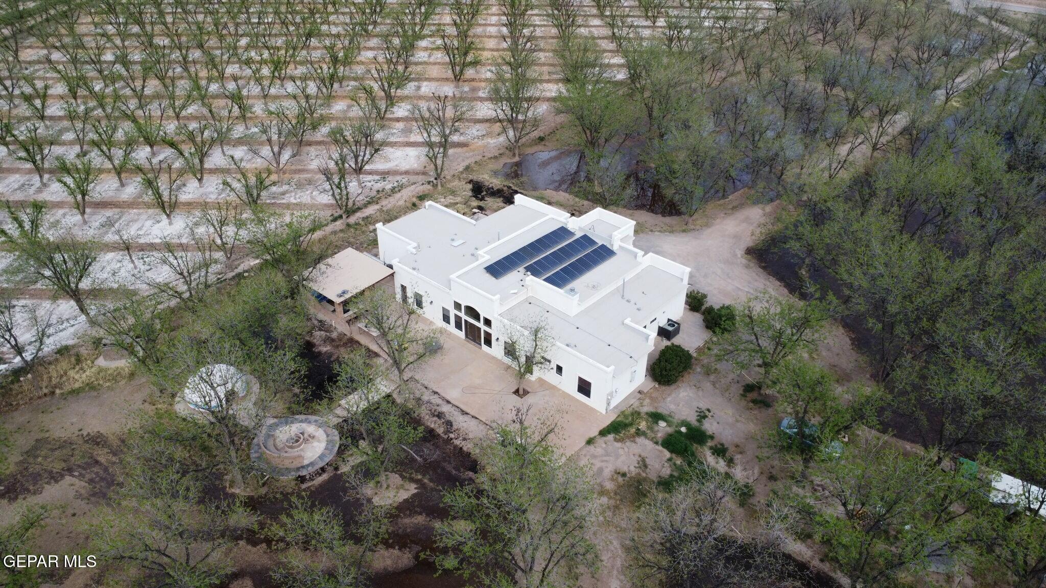 617 Wallace Road Anthony, NM 88021 - Photo 61 of 65 an aerial view of a house with a yard