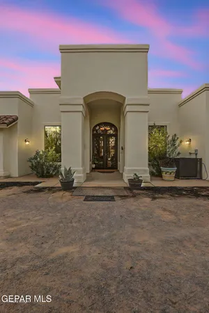 a view of an entryway with a chandelier