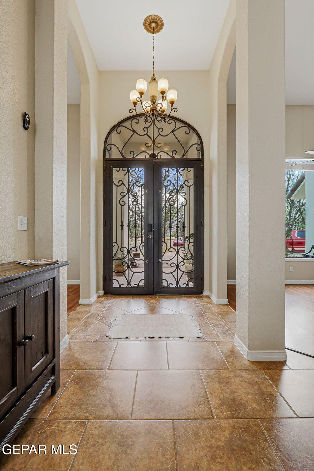 617 Wallace Road Anthony, NM 88021 - Photo 8 of 65 a view of an entryway with a chandelier