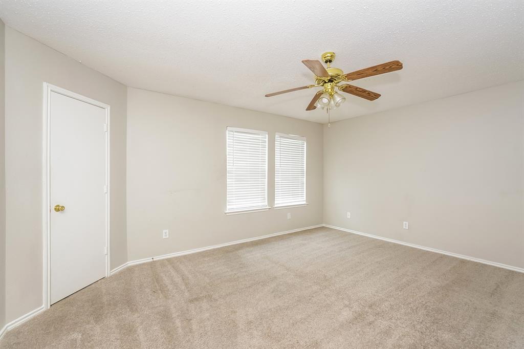 2553 Big Spring Drive Fort Worth, TX 76120 - Photo 8 of 15 a view of a room with window and ceiling fan