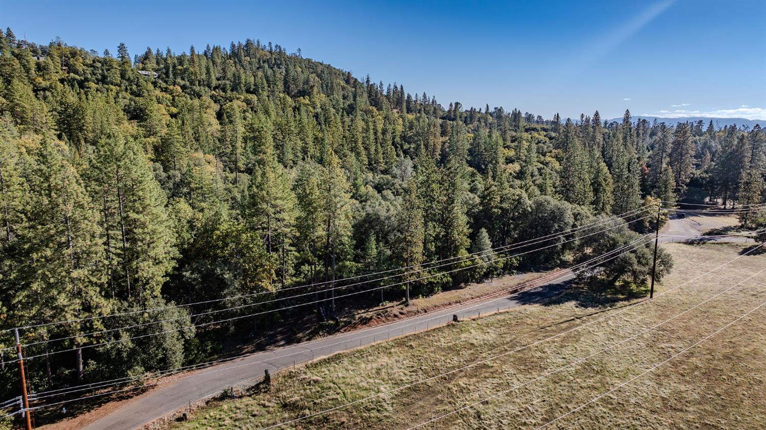 10500 Tabeaud Road Pine Grove, CA 95665 - Photo 24 of 30 a view of a bench in the backyard