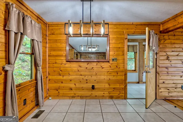 a view of a kitchen with furniture and a kitchen