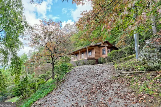 a house with trees in front of it