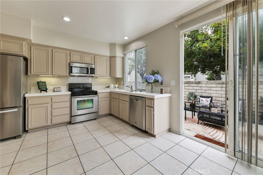 1263 Date Palm Drive Carson, CA 90746 - Photo 16 of 41 a kitchen with a sink appliances and cabinets