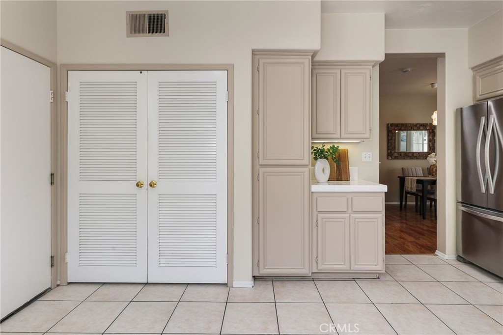 1263 Date Palm Drive Carson, CA 90746 - Photo 17 of 41 a view of kitchen with refrigerator cabinets and electronic appliances