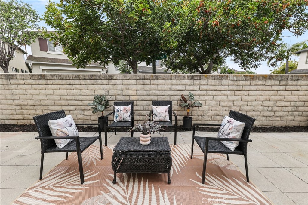 1263 Date Palm Drive Carson, CA 90746 - Photo 18 of 41 a view of a chairs and table on the terrace