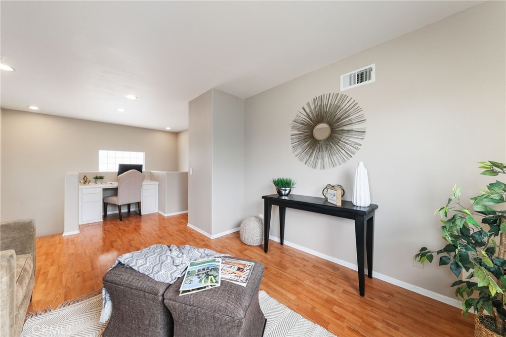 1263 Date Palm Drive Carson, CA 90746 - Photo 24 of 41 a living room with furniture and a potted plant