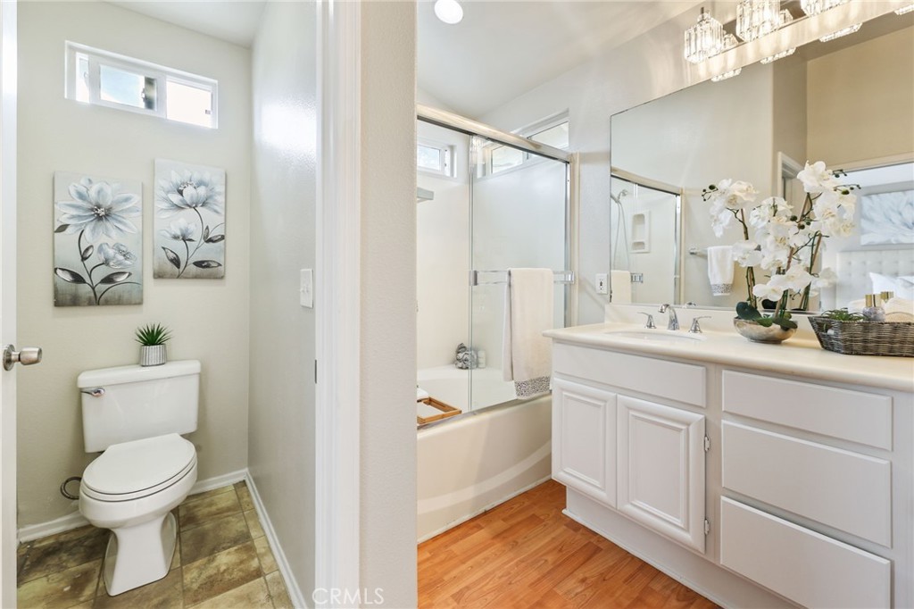 1263 Date Palm Drive Carson, CA 90746 - Photo 27 of 41 a bathroom with a sink a toilet and shower