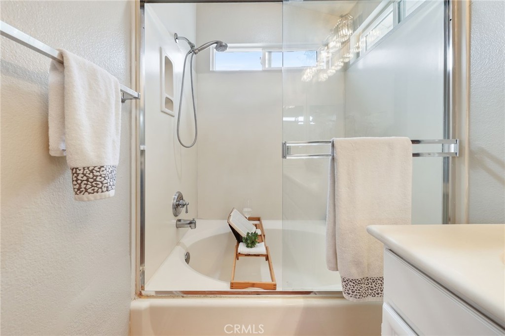 1263 Date Palm Drive Carson, CA 90746 - Photo 28 of 41 view of bathroom with a shower and mirror