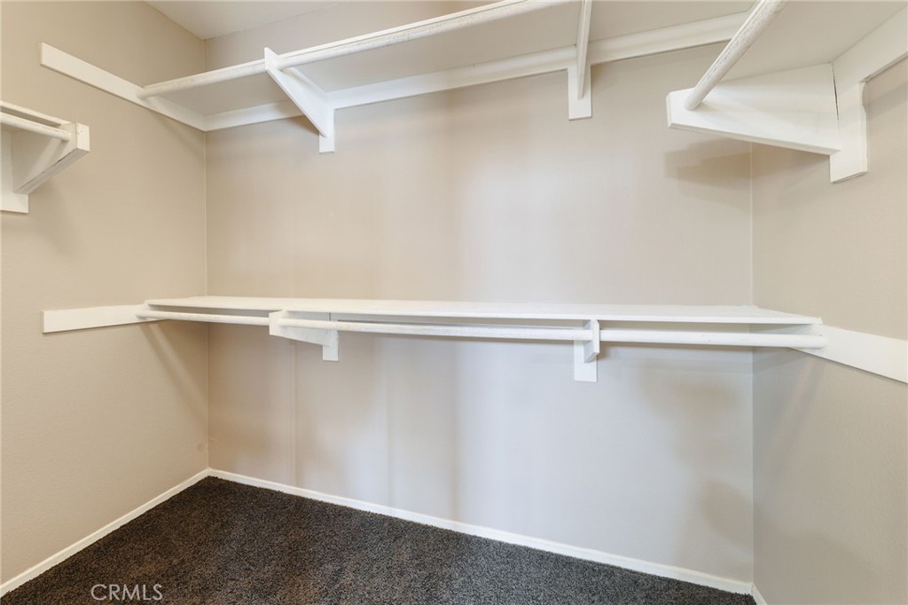 1263 Date Palm Drive Carson, CA 90746 - Photo 29 of 41 a view of a room with racks on the wall