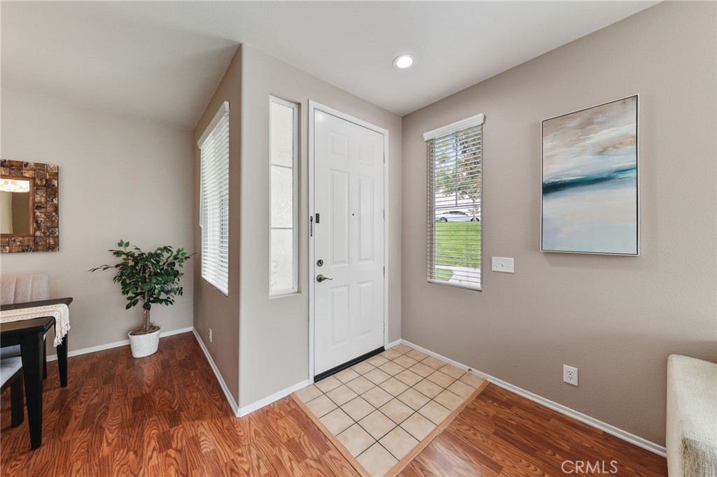 1263 Date Palm Drive Carson, CA 90746 - Photo 5 of 41 a view of an entryway with wooden floor and a potted plant