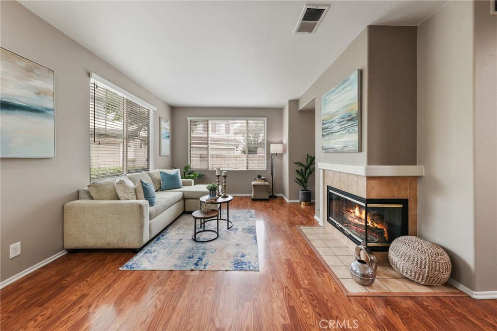1263 Date Palm Drive Carson, CA 90746 - Photo 6 of 41 a living room with furniture and a fireplace