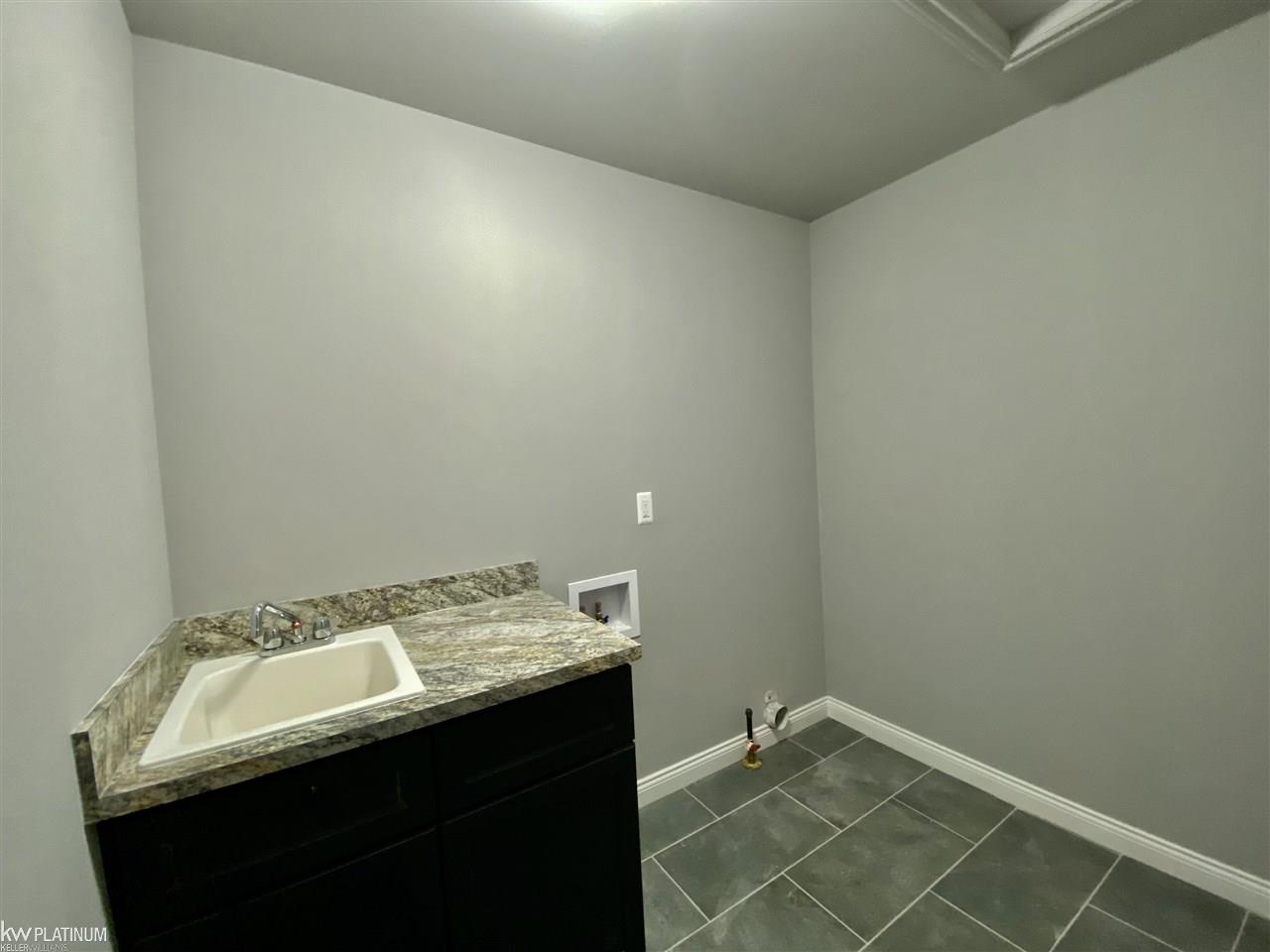 36470 25 Mile Road New Baltimore, MI 48047 - Photo 15 of 17 laundry room