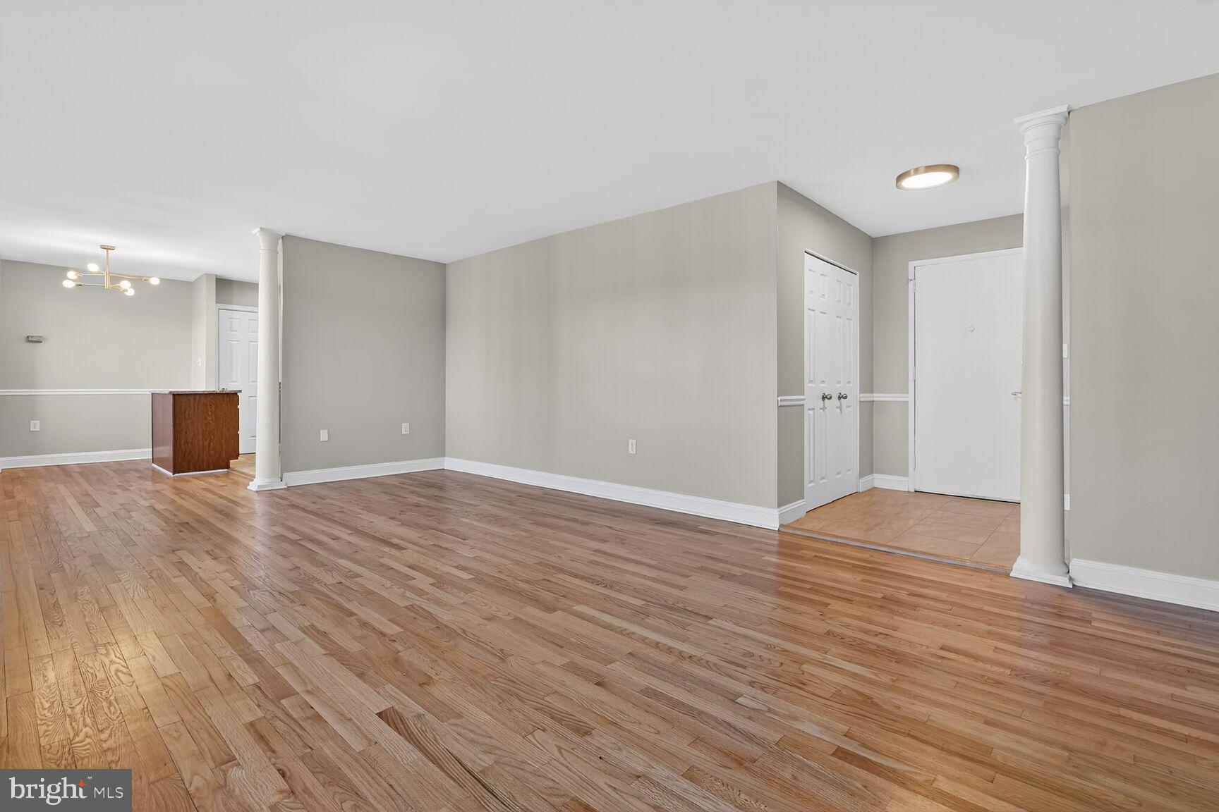 1200 South Arlington Ridge Road, Unit 504 Arlington, VA 22202 - Photo 3 of 15 a view of empty room with wooden floor