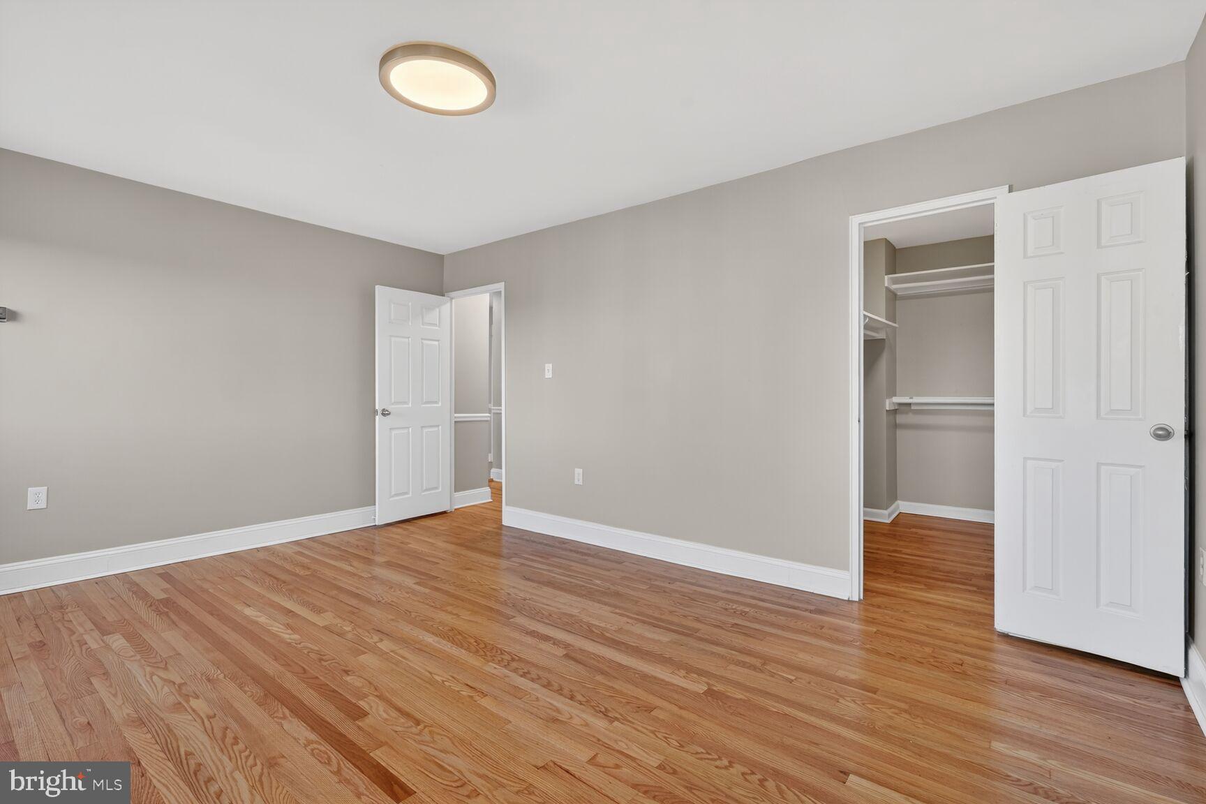1200 South Arlington Ridge Road, Unit 504 Arlington, VA 22202 - Photo 6 of 15 Spacious room with natural light and warmth.