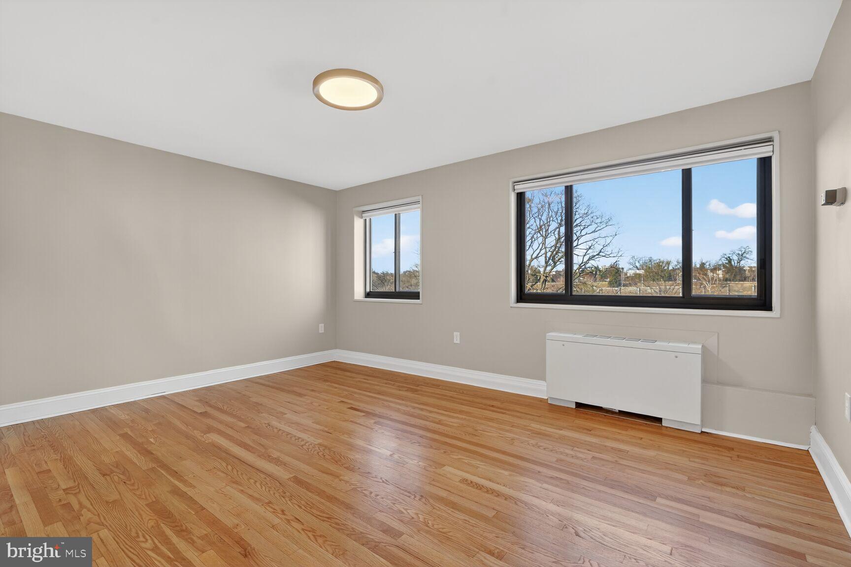1200 South Arlington Ridge Road, Unit 504 Arlington, VA 22202 - Photo 7 of 15 Bright and airy space with scenic views.