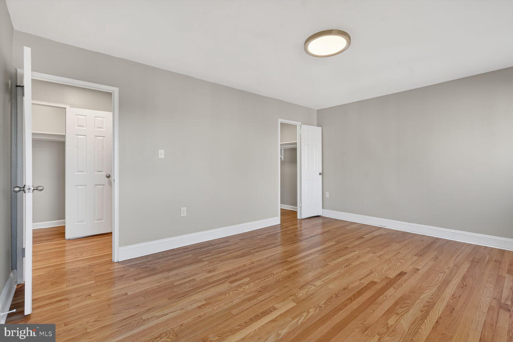 1200 South Arlington Ridge Road, Unit 504 Arlington, VA 22202 - Photo 7 of 15 a view of an empty room with wooden floor