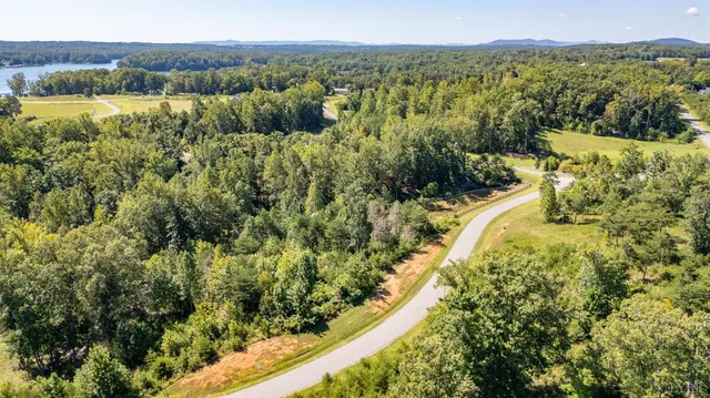 a view of a lake with a yard