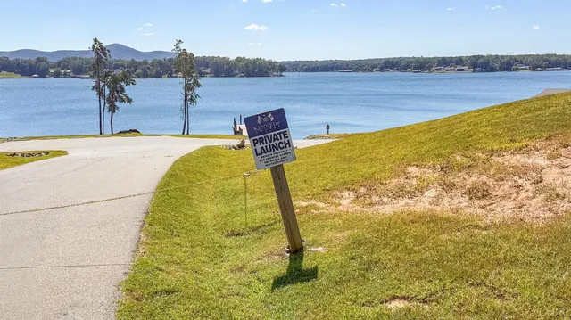 a view of house with outdoor space and swimming pool