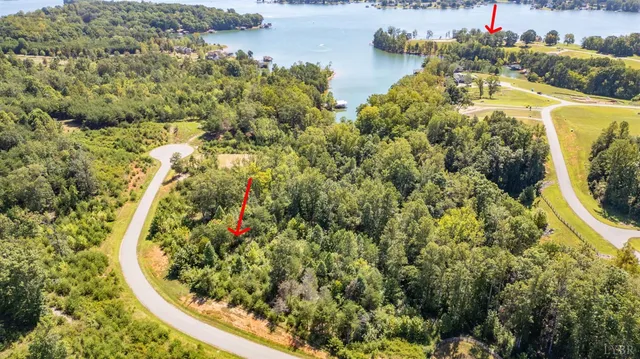 a view of a swimming pool with a lake view