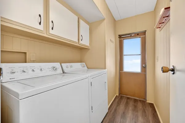 a utility room with dryer and washer