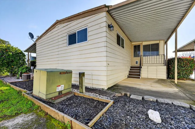 a backyard of a house with lots of green space