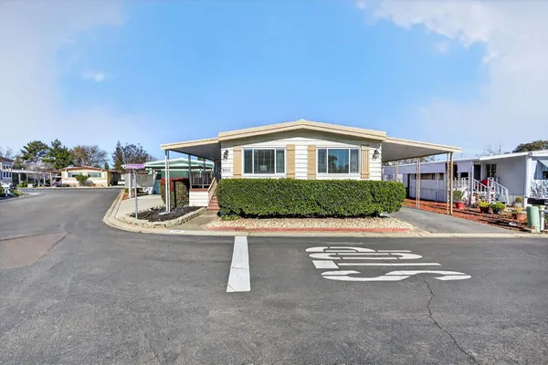 a front view of a house with porch