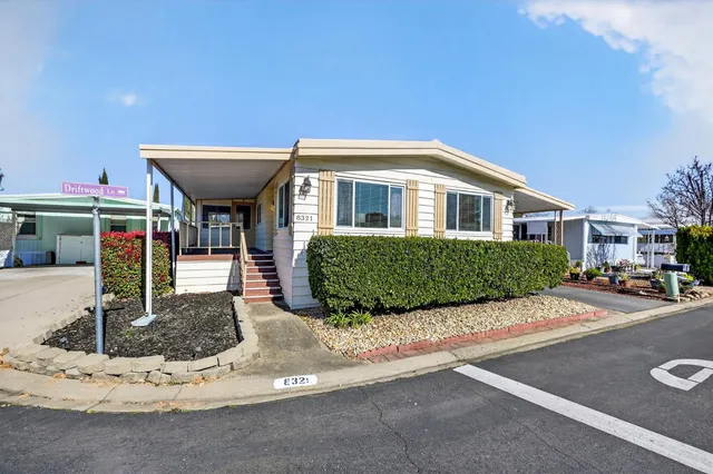 a view of a house with a porch