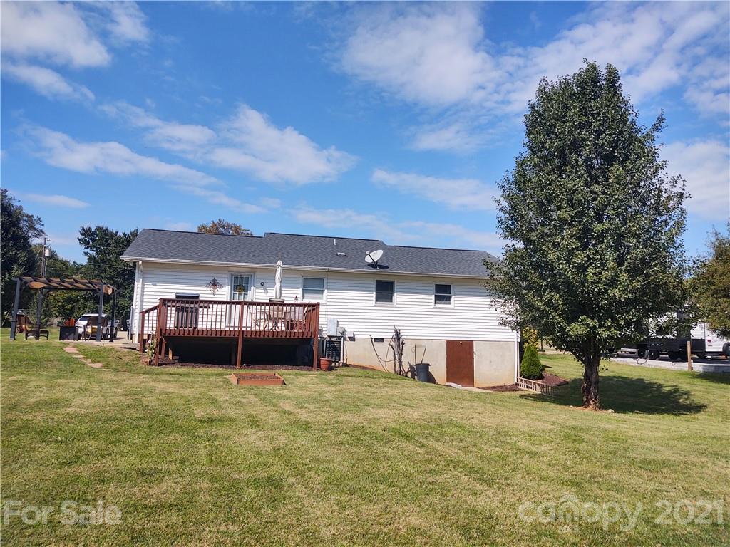 179-c C CC Hoyle Road Rutherfordton, NC 28139 - Photo 22 of 25 a front view of a house with a yard and garage